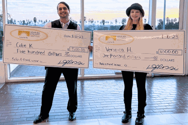 Winners Colin and Veronica with large check