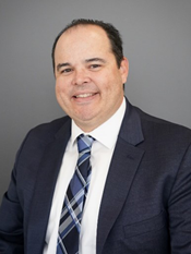 Devan Vellios Headshot