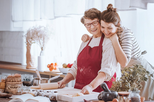 Grandma with granddaughter cooking